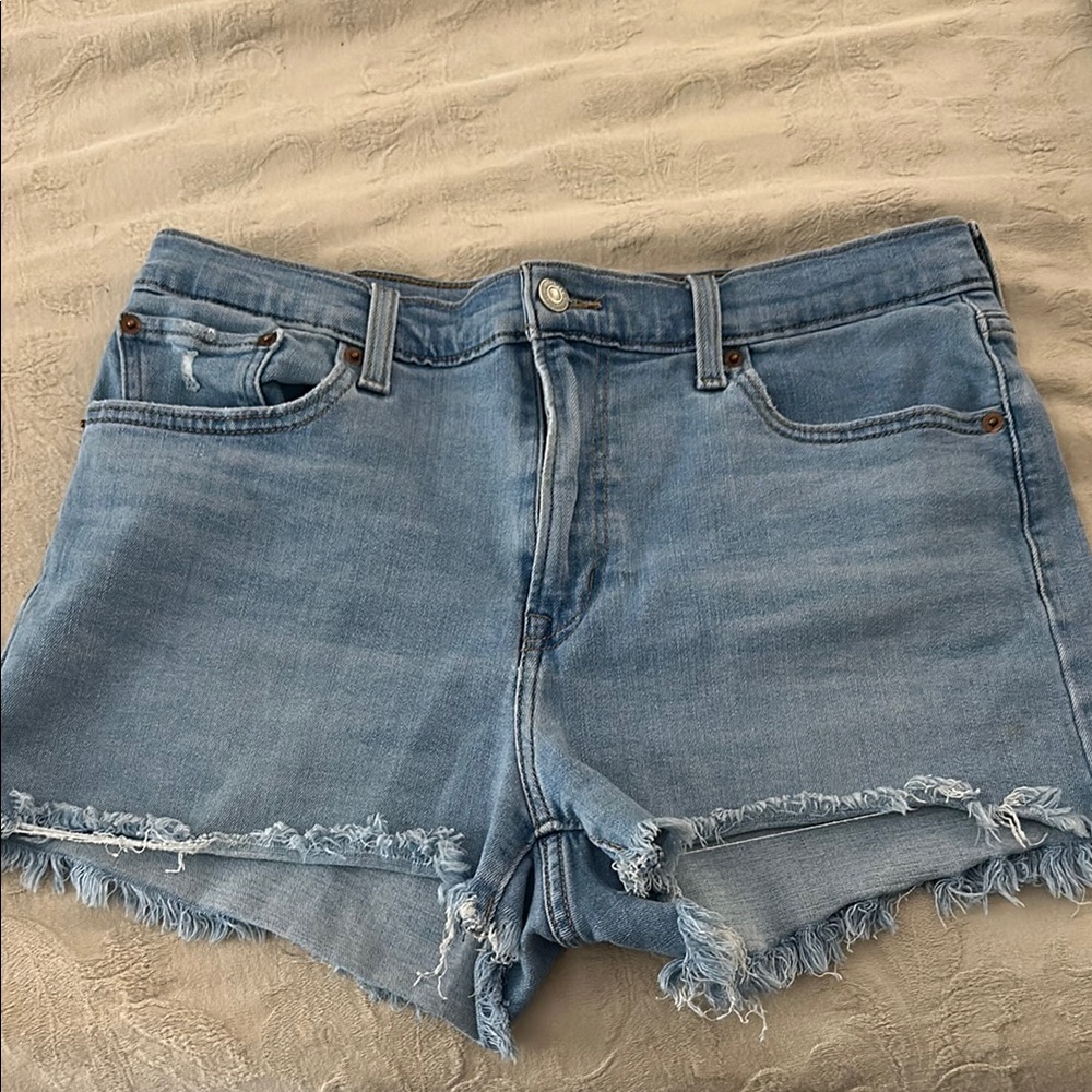 Levi's Blue Jean Shorts with Distressed Raw-Edge Hem